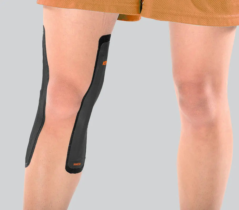 KT Tape knee strips applied to the outer and inner knee, demonstrating a two-strip taping method designed to provide targeted support while maintaining natural movement.